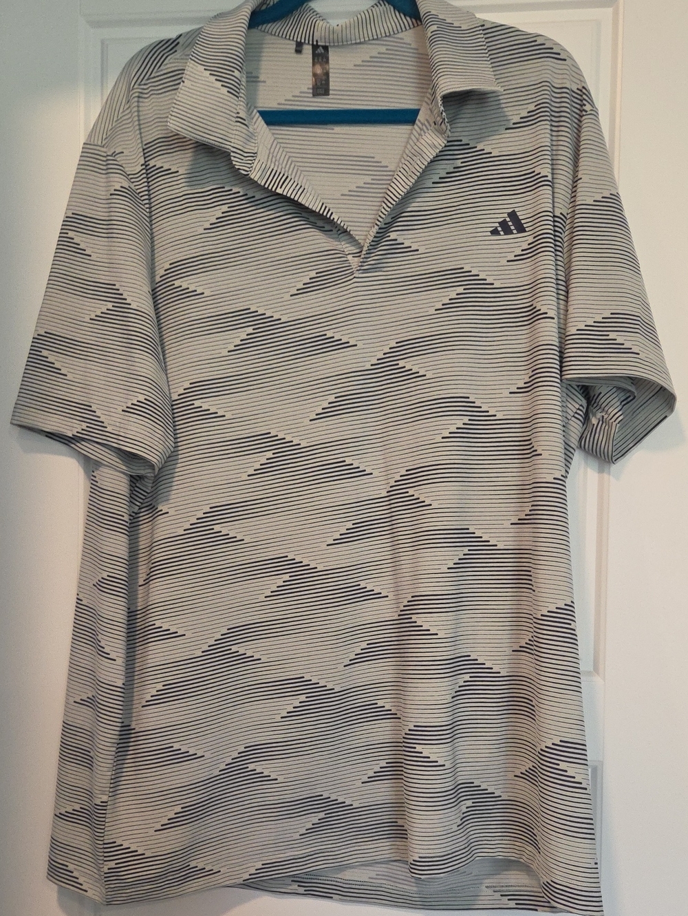 adidas Men’s Polo with Navy Striped Geo Pattern